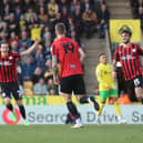 Troy Parrott (right) celebrates Emil Riis' goal (centre) alongside Alvaro Fernandez (left).