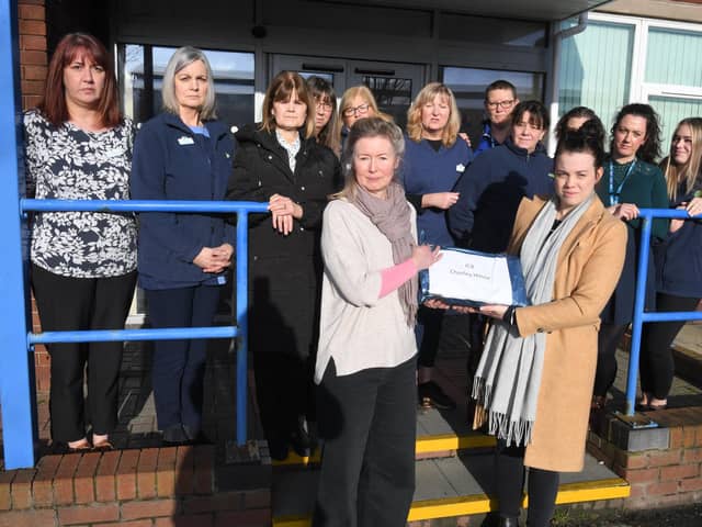 Dr. Ann Robinson (front left) and salaried GP Dr. Anna Ressel led a delegation of Withnell Health Centre staff protesting at regional NHS offices over plans to transfer their surgery to a new operator