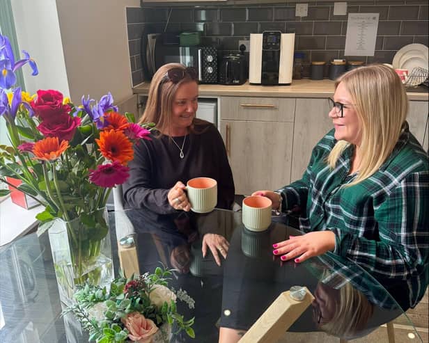 Westmorland Homecare Client Coordinators Brenda Cambridge and Ashleigh Bird discussing the forthcoming monthly coffee mornings