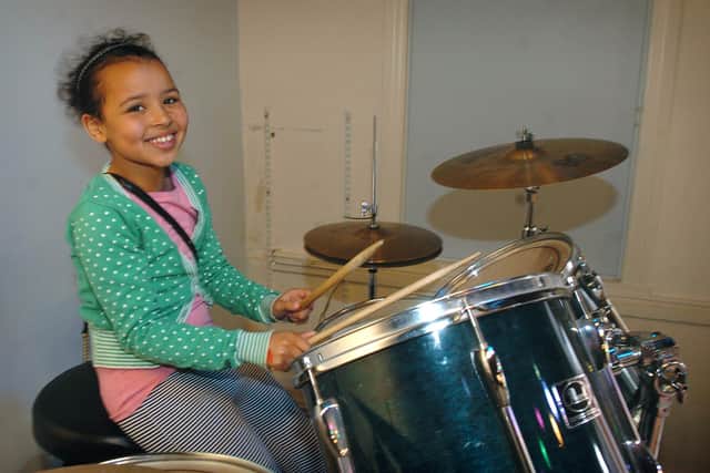 The Gregoires' daughter Ella-Grace on the drums at Streetwise in 2010, when the club was based at Lytham's Christian Centre on Preston Road.