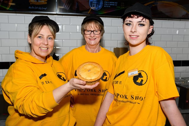 From left, staff members Tracey Ardin, Carol Robinson and Caitlin Hendrick at the opening of The Pork Shop