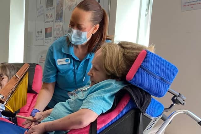 Caroline at work volunteering at Sue Ryder