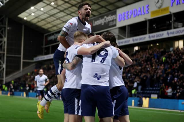 Preston North End players celebrate the opening goal scored by Emil Riis to make the score 1-0 against West Brom.