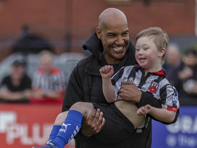 Andy Preece with a young Magpies fan (photo: David Airey/dia_images)