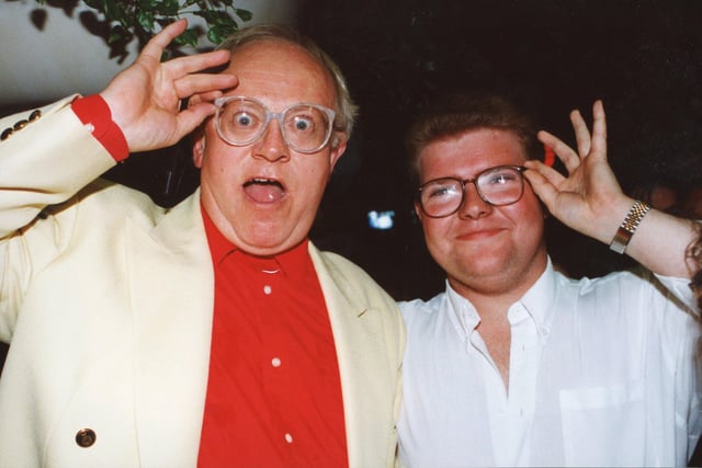 Specs appeal... Stuart Hull of Ingol shares a fun moment with Coronation Street star Ken Morley at the opening of Preston's Wall Street