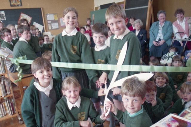 In a rare chance to cut loose from their studies, six pupils from Barton St Lawrence CE School opened their new library. Pictured: Back - Clare Priest, nine, Matthew Johnston, eight, Matthew Hoyles, eight. Front - Amy Stephenson 10, Victoria Seddon, 10, and Alan Fenn, nine, prepare to cut the ribbon
