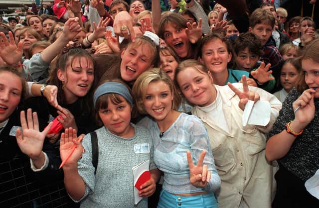 Danny Minogue meets the crowd during a broadcast from Blackpool Pleasure for the Big Breakfast in 1995