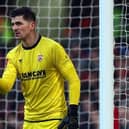 Morecambe goalkeeper Harry Burgoyne made some crucial saves in the win over Fleetwood (photo: Bryn Lennon/Getty Images)