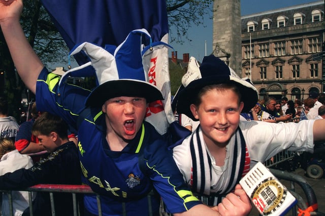 PNE fans party on the Flag Market, Graham Bramwell from Horwich and Craig Day from Ribbleton
