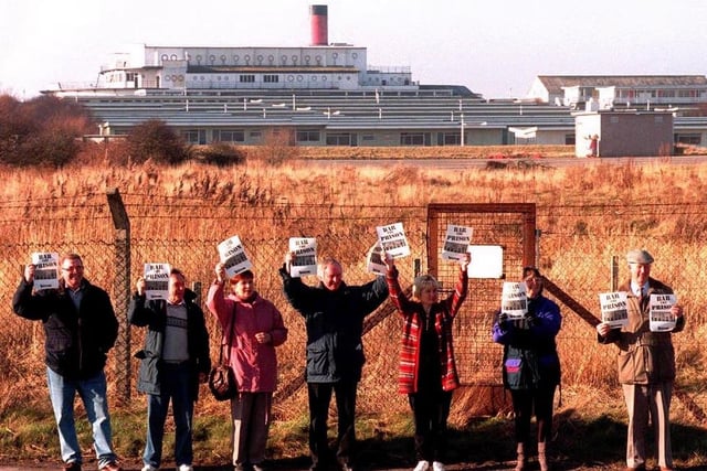 Protesting against a proposed prison at the former Pontins holiday camp. The Director General of the Prison Service, Richard Tilt, was visiting the site to see if it would be suitable as temporary accommodation for prisoners.