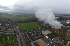A smoke plume is still visible at the former Supaskips site which has been on fire since Sunday.