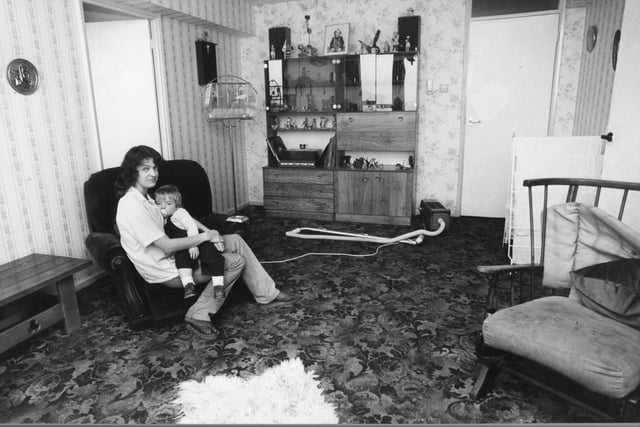 Josephine Connolly with son Michael in her living room on the eighth floor of York House, Avenham