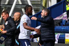 Preston North End's Joshua Onomah is subbed off and greeted by Ryan Lowe