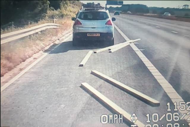 Car seized for insecure load (Image: Lancashire Road Police).