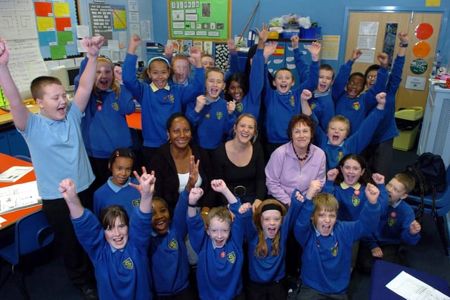 Year 6 pupils and teaching staff from St Joseph's Catholic Primary School in Preston celebrate their sustained improvement Ofsted rating