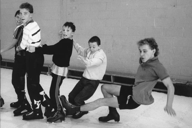 Instructor Richard Peck starts slipping at the end of the line on a specially-installed synthetic ice rink laid down for a day at Fulwood Leisure Centre in 1989