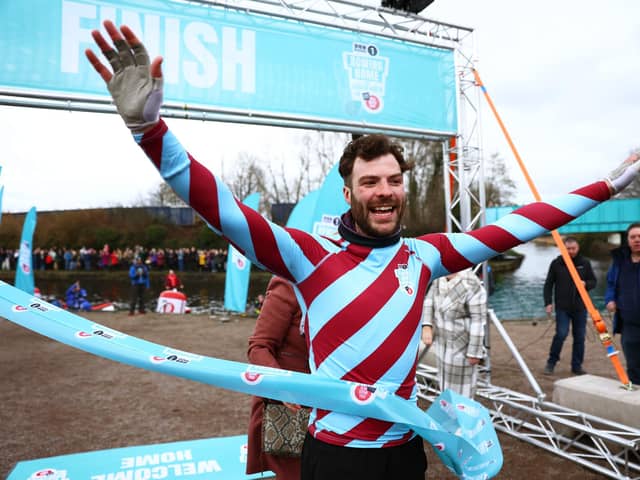 Jordan North arrives home in Burnley after his 100 mile rowing challenge from London to Burnley