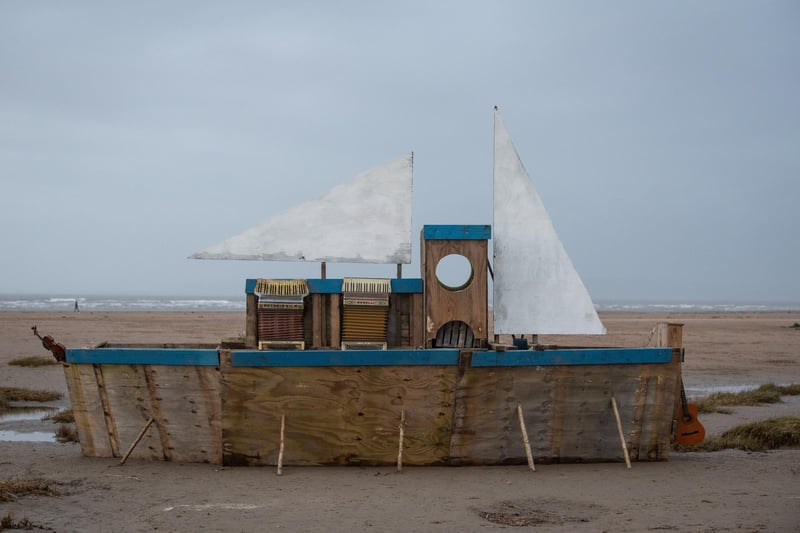A boat was constructed out of wood which was then sent out to sea.