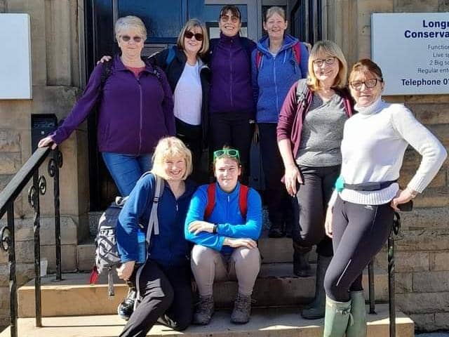 A long way to go for a drink but all in a good cause, Joy (back row, far right) and Margaret (front row, second from the right) with some of those who joined them on their annual charity 10 mile, 10 pub walk this year