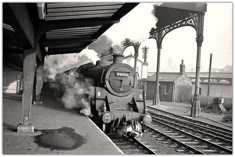 Maybe this picture will evoke memories of travelling by steam train in the 1960s? The image was taken in 1966 and shows a steam train (Ivatt 2-6-0 No. 75050) standing at platform 6 (now renumbered 4) of Preston Railway station with a train to the south. Picture courtesy of Preston Digital Archive.