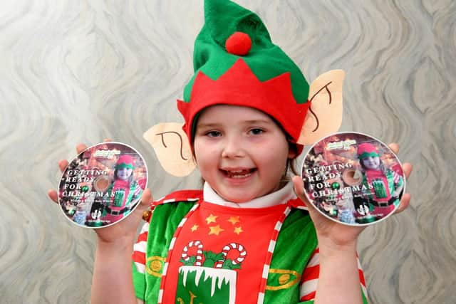 Ruby Whittle, seven, has written a christmas song to raise money for Derian House.
