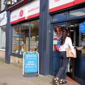 Evri signs in the window of a Post Office branch. Picture: Mark Dolby