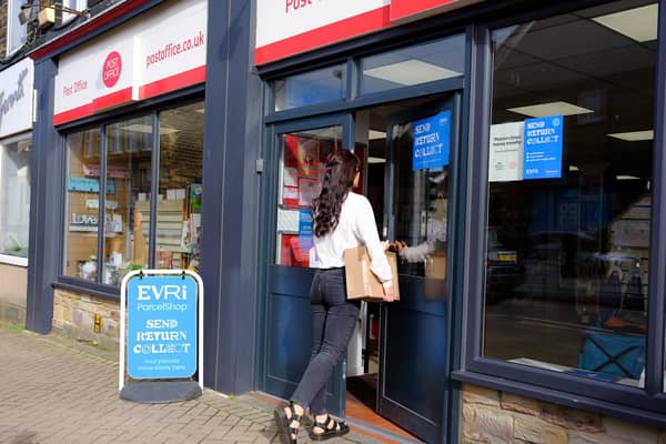 Evri signs in the window of a Post Office branch. Picture: Mark Dolby