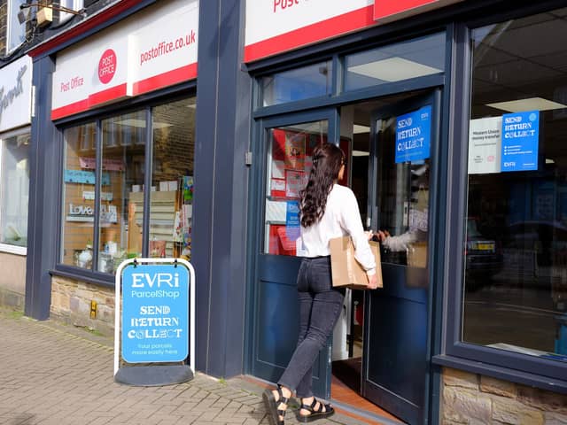 Evri signs in the window of a Post Office branch. Picture: Mark Dolby