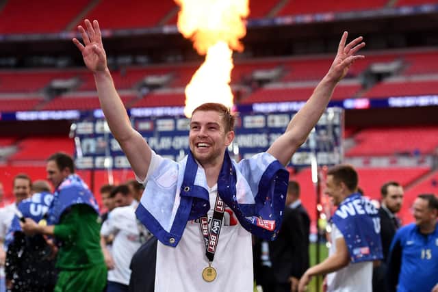 Paul Huntington celebrates Preston North End's play-off final victory at Wembley in May 2015