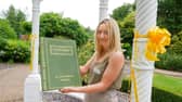 Kelly Thomson, head of administration at St Catherine’s Hospice, pictured with the Yellow Ribbon Remembrance Book