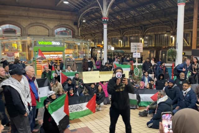The demonstrators spent half an hour at the station, calling for a ceasefire in the conflict in Gaza (image: Children of the Ghetto)