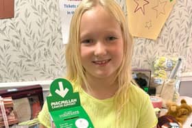 Elsie, a pupil at Chorley New Road Primary Academy helping to fundraise for Macmillan Cancer Support. Photo:  St Catherines Care Home