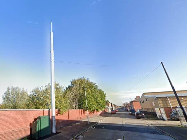 The new mast would be located on Eldon Street (opposite no. 239) just beyond the one pictured (opposite no. 249) [image: Google]