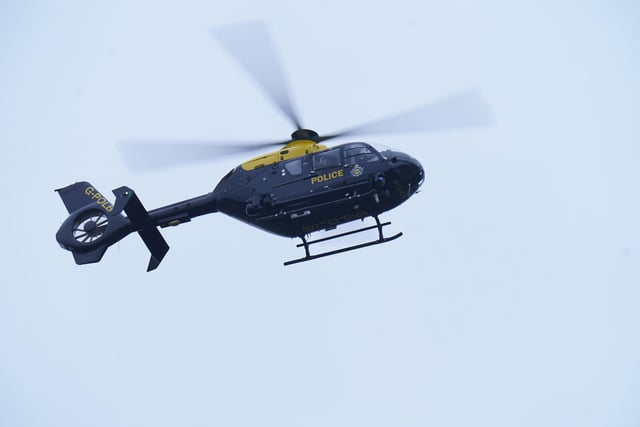 A police helicopter over St Michael's on Wyre as police continue their search for missing mum Nicola Bulley, 45, who was last seen walking her dog on a footpath by the River Wyre on the morning of Friday January 27. Picture date: Saturday February 4, 2023