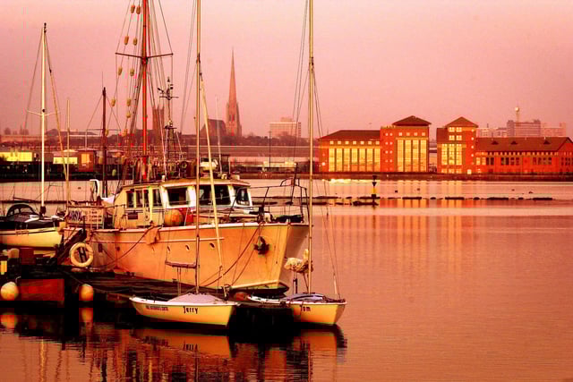 Preston docks was once a bustling hive of activity until it was closed down and turned into a leisure area with various boats moored in the Marina, and housing in the background