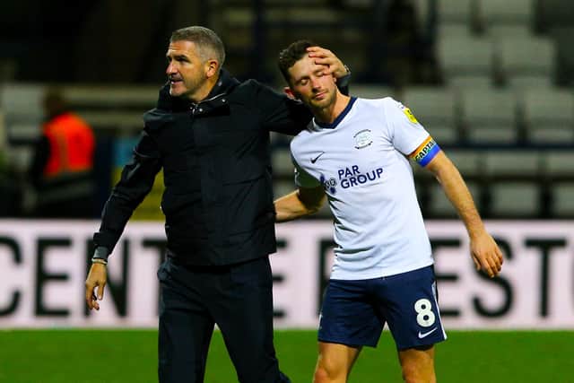 Preston North End manager Ryan Lowe hugs Alan Browne after the match.