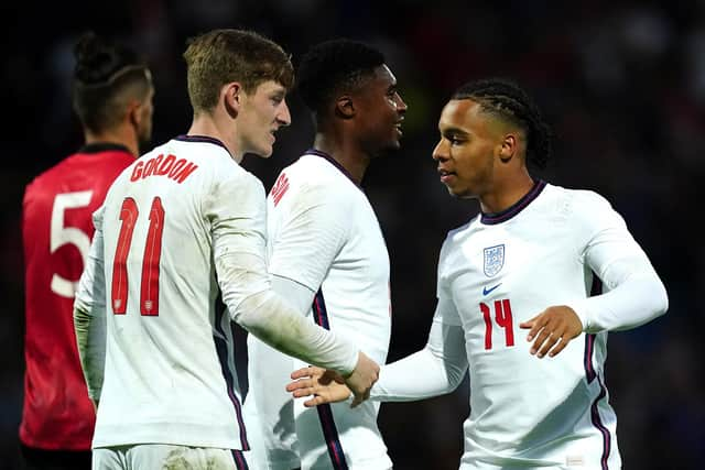 Cameron Archer celebrates with Anthony Gordon after scoring England Under-21s third goal against Albania