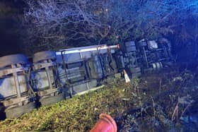 The lorry driver suffered minor injuries after overturning on the southbound M6 between junctions 23 and 24 earlier this morning