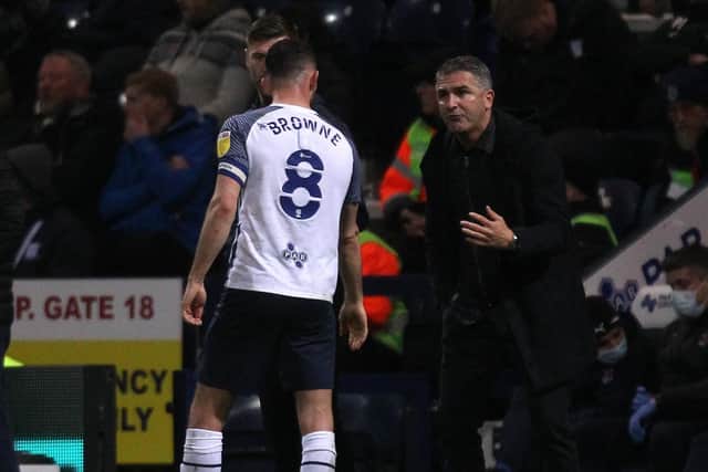 Preston North End manager Ryan Lowe  gives instructions to skipper Alan Browne during the win against Blackpool
