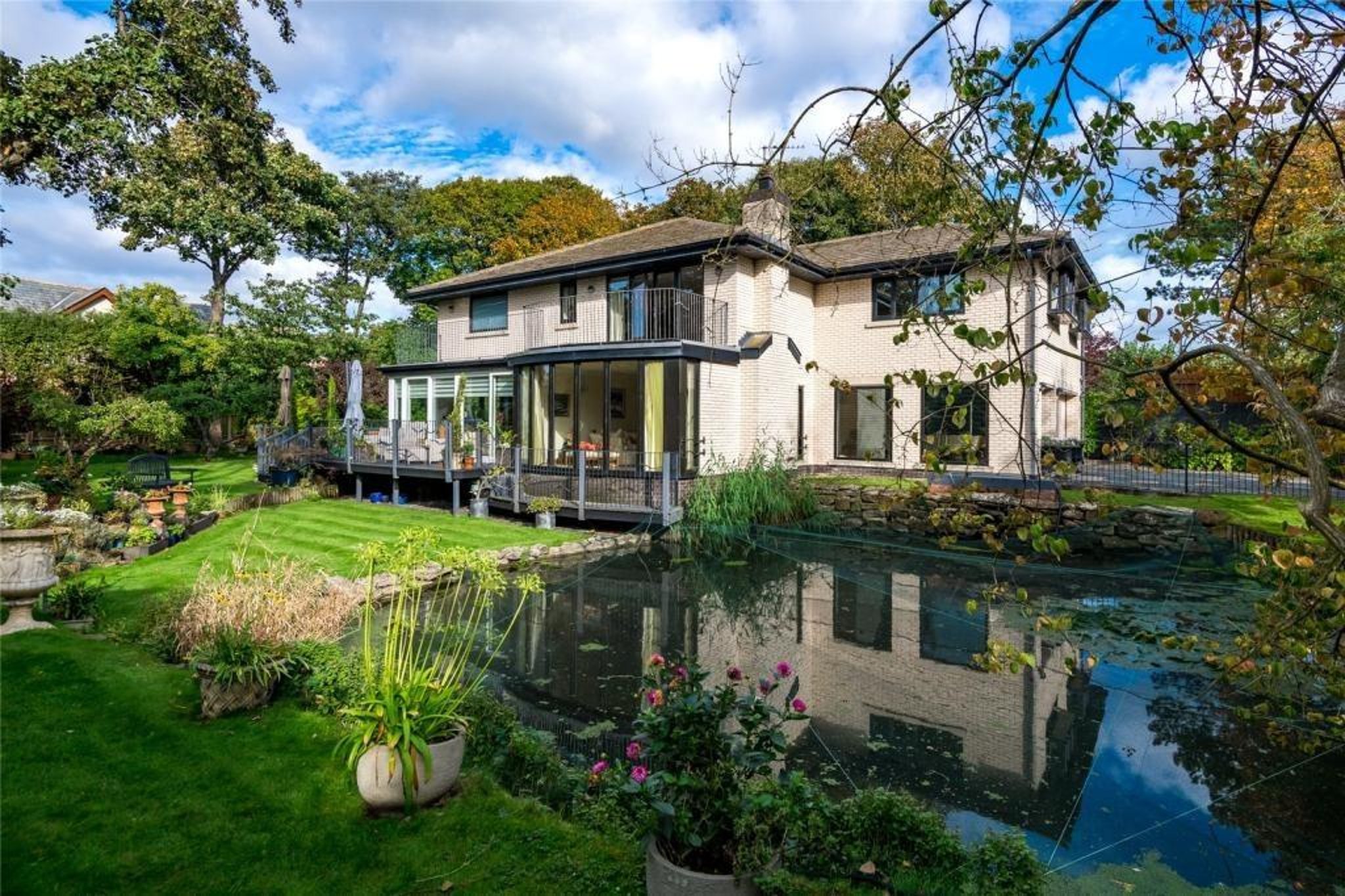 Classy and contemporary four-bed Fylde home with bespoke design and mind-blowing garden on the market for £950,000