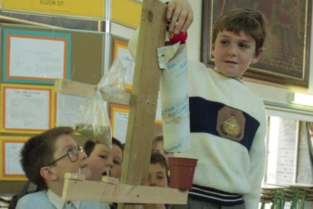 Budding scientists at Preston schools are showing off their skills in an exhibition. Pupils at five primary schools took part in a project, organised by Fulwood High School, to test their problem solving skills. Pictured: Scott Collins, 11, from Eldon Street School, starts the clock on his "machine"