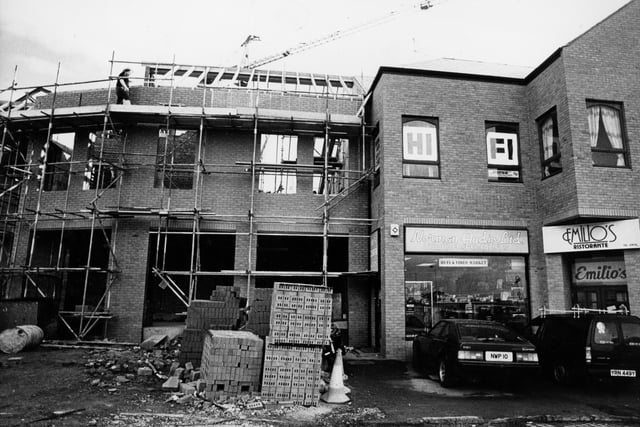 This image shows the popular Italian restaurant Emilio's on Butler Street in Preston. And building work on the new Debenhams/Fishergate Centre development