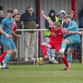 From the left, Jack Hazlehurst, Mike Calveley and Ollie Shenton in the thick of the action during Chorley's FA Trophy win over Hythe Town last weekend (photo: David Airey/dia_Images)