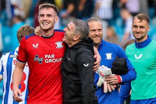 Preston North End manager Ryan Lowe hugs goalscorer Liam Lindsay