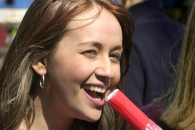 Maria, played by Samia Ghadie, gets her teeth round some Blackpool rock in 2002