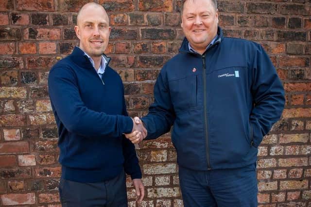 Mark Trickett pictured with Phil Gornall, director and head of the building surveying team at Cassidy + Ashton's Preston office