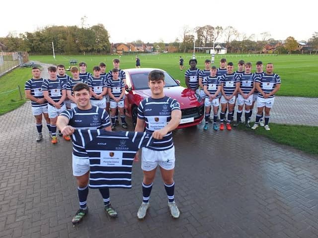The Kirkham Grammar School first XV celebrate the sponsorship by Porsche Centre, Preston.