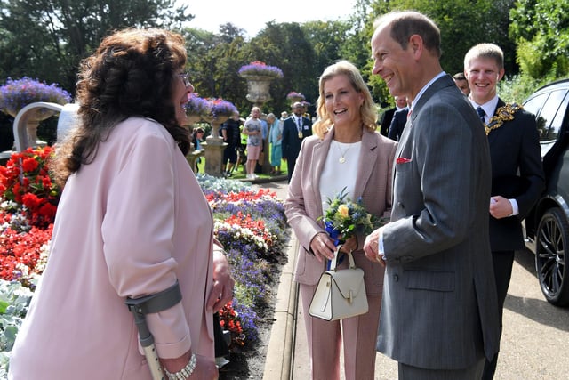 The Royals were greeted with flowers from Preston locals