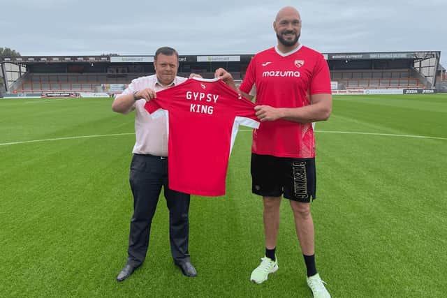 Tyson Fury with Morecambe's head of commercial, Martin Thomas Picture: Morecambe FC