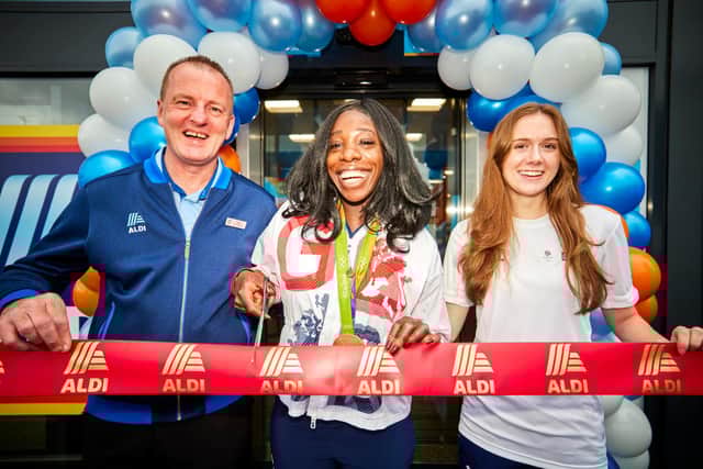Aldi Tarleton near Preston grand opening Store Manager Tony Breen and Team GB Athlete: Anyika Onoura  retired British sprint track and field athlete and SportsAid Athlete: Adelaide Barnes GB Taekwondo